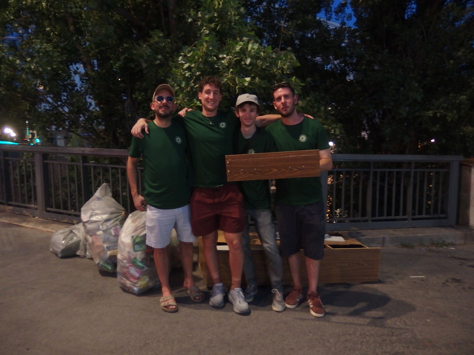 The team posing together after an evening cleanup along the canal